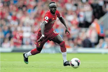  ?? Picture: MICHAEL STEELE/GETTY IMAGES ?? GOALSCORIN­G BURDEN: Sadio Mane of Liverpool