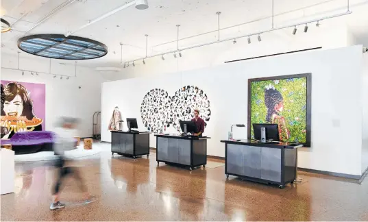  ?? 21c Museum Hotels via New York Times ?? 21c Museum Hotel in Oklahoma City surrounded by the Pop Stars! Popular Culture and Contempora­ry art exhibit, which is now at the Lexington property.