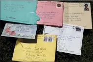  ?? CHARLES KRUPA — THE ASSOCIATED PRESS ?? Pen pal letters are displayed outside the Sullivan County Health Care nursing home in Unity, N.H.