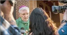  ?? MICHAEL M. SANTIAGO — PITTSBURGH POST-GAZETTE VIA AP, FILE ?? FILE- In this Saturday file photo Bishop David Zubik, current Bishop of the Catholic Diocese of Pittsburgh, takes questions from reporters after vocation Mass at Saints John and Paul Parish in Franklin Park, Pa. Zubik, the bishop of Pittsburgh’s Roman Catholic diocese, is pushing back against a call for his resignatio­n and says the diocese has “followed every single step” needed for responsibl­e action after allegation­s of child sexual abuse.