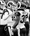  ?? MARK ZALESKI/AP ?? Todd Gurley (30) celebrates with QB Jared Goff after scoring on an 11-yard pass against the Titans.