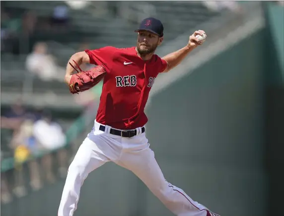 ?? GERALD HERBERT — THE ASSOCIATED PRESS ?? Boston Red Sox starting pitcher Chris Sale (41) throws in the second inning of their spring training baseball game against the Detroit Tigers in Fort Myers, Fla., Monday, March 6, 2023.