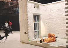  ?? AFP ?? Artist Sarmad Khoosat during a 24-hour live performanc­e as ‘Prisoner Z’ in isolation, in Lahore. The project, dubbed ‘No Time to Sleep’, saw actor Khoosat embody ‘Prisoner Z’,