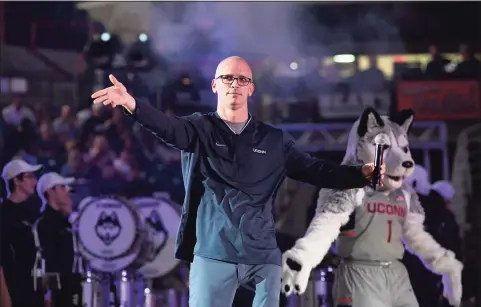 ?? Jessica Hill / Associated Press ?? Connecticu­t men’s head coach Dan Hurley is introduced during the UConn’s men’s and women’s basketball teams annual First Night celebratio­n in 2018.