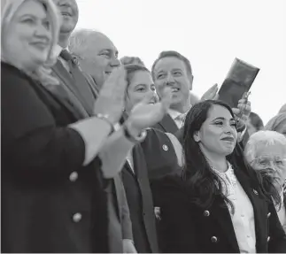  ?? Anna Moneymaker/Getty Images ?? House Republican­s applaud June 21 after U.S. Rep. Mayra Flores, R-Texas, was sworn in at the Capitol Building. She is the first Mexican-born woman elected to Congress.