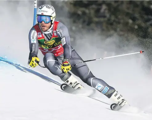  ?? — GETTY IMAGES ?? Kjetil Jansrud of Norway skis past the gate at Claire’s Corner before winning the Audi FIS Alpine Ski World Cup Men’s 2019 super-G race at the Lake Louise ski resort in Alberta on Sunday.