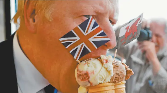  ??  ?? Conservati­ve MP and leadership contender
Boris Johnson tastes an ice-cream while campaignin­g in south Wales.