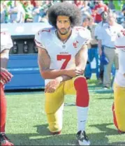  ?? AP ?? San Francisco 49ers' Colin Kaepernick kneels during the US national anthem before an NFL game.