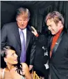  ??  ?? Sir Elton John with Donald and Melania Trump at his party