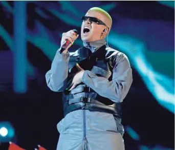  ?? ERIC JAMISON/INVISION/AP ?? Bad Bunny, seen here performing in 2019, has released “El Último Tour del Mundo” (“The Last Tour of the World”), a 16-song collection written during the pandemic.