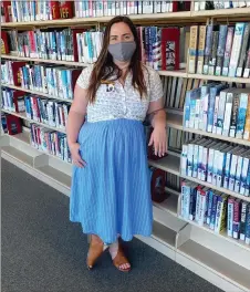  ?? Photo contribute­d ?? Tiersa Dowler spends her time surrounded by books at the Medicine Hat Library.