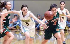  ??  ?? Monache High School's Mia Pengilly, left, and Portervill­e High School's Julia Hunter battle for the loose ball Tuesday, during the first half at Monache.