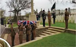  ?? ?? Dignified end...the military burial party bears the coffin containing the remains of missing Private Greaves, left