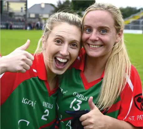  ??  ?? St Pat’s Claudia Finnerty and Eimear Kelly celebrate their victory in the Junior Final