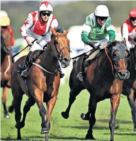  ??  ?? Back with a bang: Sammy Jo Bell and Dubai Acclaim (left) land the Leger Legends