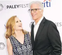  ?? RICH FURY/THE ASSOCIATED PRESS ?? Marg Helgenberg­er and Ted Danson celebrate the CSI finale. “It was a delight to be back,” Helgenberg­er says.