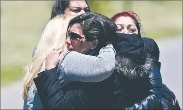  ?? AP/ESTEBAN FELIX ?? Relatives of missing submarine crew member Celso Oscar Vallejo react to the news Thursday at the Mar de Plata Naval Base in Argentina that a sound detected during the search for the submarine is consistent with that of an explosion.