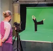  ?? COURTESY OF THE CLICK ?? Videograph­er Lindsay LaPointe captures The Click dancer Rachel Linsky on green screen for use in “Emotive Land.”