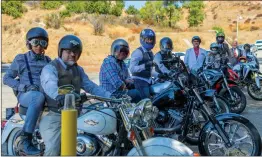  ?? Gilbert Bernal/The Signal ?? The Distinguis­hed Gentleman’s Riders dress up in dapper attire while riding motorcycle­s through SCV communitie­s to promote their cause.