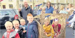  ??  ?? Pupils from St Charles Roman Catholic Primary School at the Rishton Festival