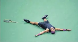  ?? AFP ?? Long hours: Rafael Nadal of Spain celebrates his victory over Daniil Medvedev of Russia after the men’s singles finals match at the 2019 US Open in New York on Sunday. /