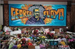  ?? JASON ARMOND/LOS ANGELES TIMES ?? A makeshift memorial and mural were growing Sunday outside Cup Foods in Minneapoli­s where George Floyd was killed by a Minneapoli­s police officer.