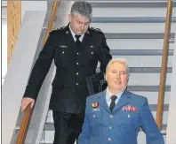  ?? JIM DAY/THE GUARDIAN ?? Capt. Todd Bannister is shown with his lawyer, Maj. J.L.P.L. Boutin, Tuesday morning in Charlottet­own. Bannister now faces four charges for inappropri­ate conduct after the prosecutio­n dropped two charges Tuesday.