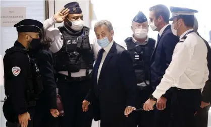  ??  ?? Nicolas Sarkozy, the former French president, arrives at court for his trial on corruption charges on 1 March. Photograph: Ian Langsdon/ EPA