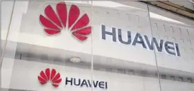  ?? Andy Wong / Associated Press archive ?? Security experts say the U.S. government is likely exaggerati­ng the threat it says Huawei poses to next-generation wireless networks.