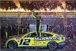  ?? LM OTERO — THE ASSOCIATED PRESS ?? Ryan Blaney celebrates in Victory Lane after winning the NASCAR All-Star auto race at Texas Motor Speedway in Fort Worth on Sunday.