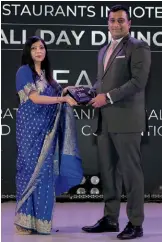  ?? ?? Vedagiri Rajaram, F&B director, Sheraton Grand Bengaluru Whitefield Hotel & Convention Center with the award for Best All-Day Dining restaurant in a hotel.