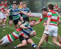  ??  ?? Gorey’s Andrew Walsh is brought to ground by Andy Thompson.