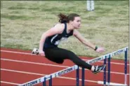  ?? DENNIS KRUMANOCKE­R - FOR DIGITAL FIRST MEDIA ?? Kutztown hurdler Marley Turbett leads the way in the girls 100 meter hurdles.