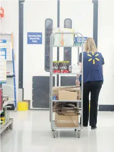  ?? PETER J. THOMPSON ?? Walmart may consider expanding its program catered for returning workers if it turns out to be successful at its tech unit.