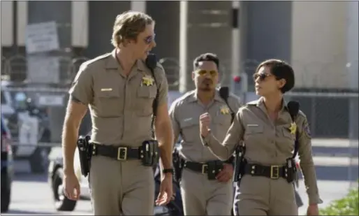  ?? PHOTO WARNER BROS VIA AP ?? This image released by Warner Bros. Pictures shows Dax Shepard, from left, Michael Peña and Rosa Salazar in a scene from, “CHiPS.”