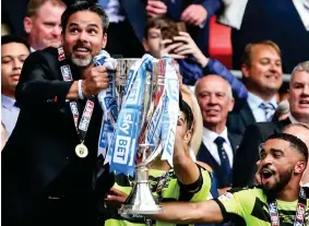  ?? SPORTIMAGE VIA PA ?? Lift: Wagner leads Hudderfiel­d to promotion in May