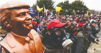  ?? ROBERTO SCHMIDT/AFP ?? Donald Trump's supporters stormed the Capitol on Wednesday, triggering unpreceden­ted chaos and violence.