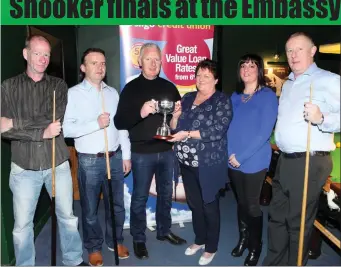  ??  ?? Marie and Shirley Pavia presenting the Vincent Pavia Memorial Perpetual Cup to Colm McDonagh, also pictured Fergal Flanagan, Damien Conway, runner up and Ronnie Cawley. The snooker season came to a climax at the Embassy Snooker club Friday night last....