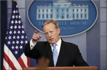  ?? AP PHOTO/ALEX BRANDON ?? White House press secretary Sean Spicer points to a questioner during the daily news briefing at the White House in Washington on Monday.