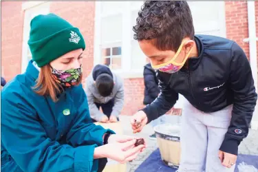  ?? Jarret Liotta / For Hearst Connecticu­t Media ?? Instructor Meghan Hadley works with Jerson Gonzalez, 9, at Tracey Magnet School on Thursday in Norwalk.