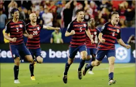 ?? ASSOCIATED PRESS ?? UNITED STATES’ JORDAN MORRIS (8) celebrates with teammates after scoring a goal against Jamaica during the second half of Wednesday’s Gold Cup final in Santa Clara, Calif.