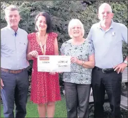  ??  ?? Debbie Dickman from Loros receives a cheque from Rosemary Tate (centre) for the proceeds of a gold day in memory of Rosemary’s husband Brian Tate. The pair are flanked by Rosemary’s brother Dave Fitch and golfing pal Bruce Scott.