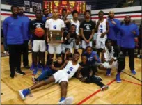  ?? DAVID C. TURBEN — FOR THE NEWS-HERALD ?? Richmond Heights poses with its Division IV regional championsh­ip after a 46-43 win over New Middletown Springfiel­d on March 15 in Canton.