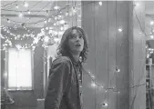  ??  ?? Joyce (Winona Ryder) and her Christmas lights set off a string of extraordin­ary events in Season 1.