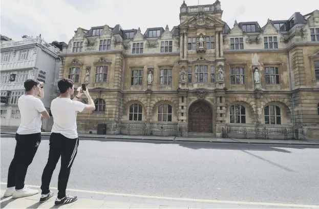  ??  ?? 0 A statement issued by Oriel College on Wednesday night said the governing body had voted in favour of launching an independen­t inquiry into the statue