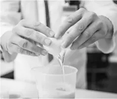  ??  ?? An employee of the Chemical veterinary examinatio­n office tests eggs for contaminat­ion by the insecticid­e fipronil in Krefeld, western Germany. — AFP photo