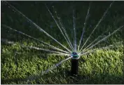  ?? GETTY IMAGES ?? Brown spots, weedy spots and soggy areas of a lawn can indicate problems with your irrigation system.