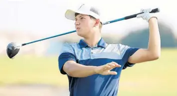  ?? STEPHEN M. DOWELL/ORLANDO SENTINEL ?? Lake Nona’s Austin Cherichell­a tees off during the Elite 8 Invitation­al boys golf tournament at ChampionsG­ate Golf Club in Davenport on Sept. 18. He helped the Lions win a third consecutiv­e region championsh­ip on Wednesday.