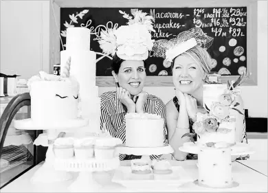  ?? PHOTOS: GALIT RODAN
THE CANADIAN PRESS ?? Le Dolci bakery owner Lisa Sanguedolc­e, left, and general manager Danielle Ellis, are promoting a selection of royal-inspired desserts in Toronto, ahead of Prince Harry’s wedding to Meghan Markle.