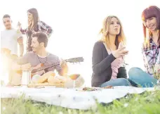  ?? GETTY IMAGES ?? Summer is the perfect time to try a new wine with friends.